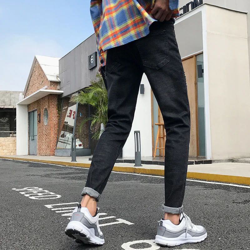 Осень и зима новые мужские модные повседневные джинсы Молодежные темпераментные