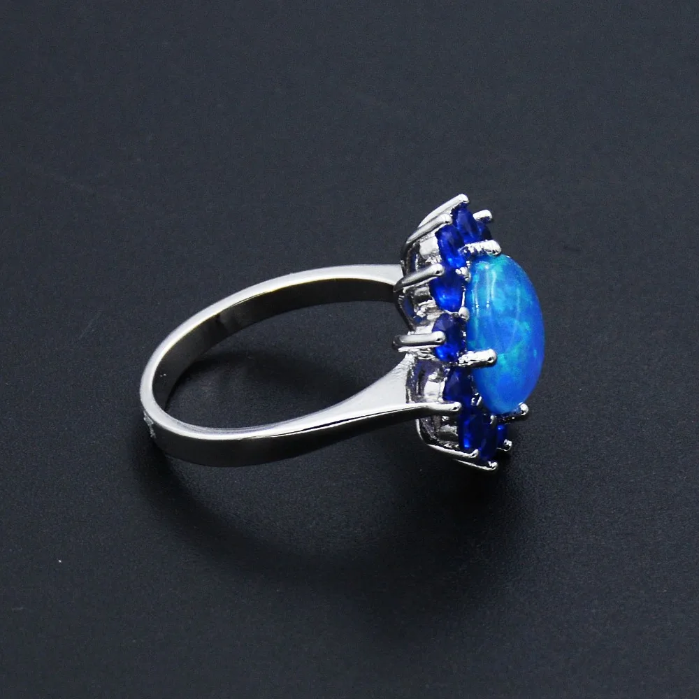 Элегантный океан синий лабораторный огненный опал кольцо с фиолетовым