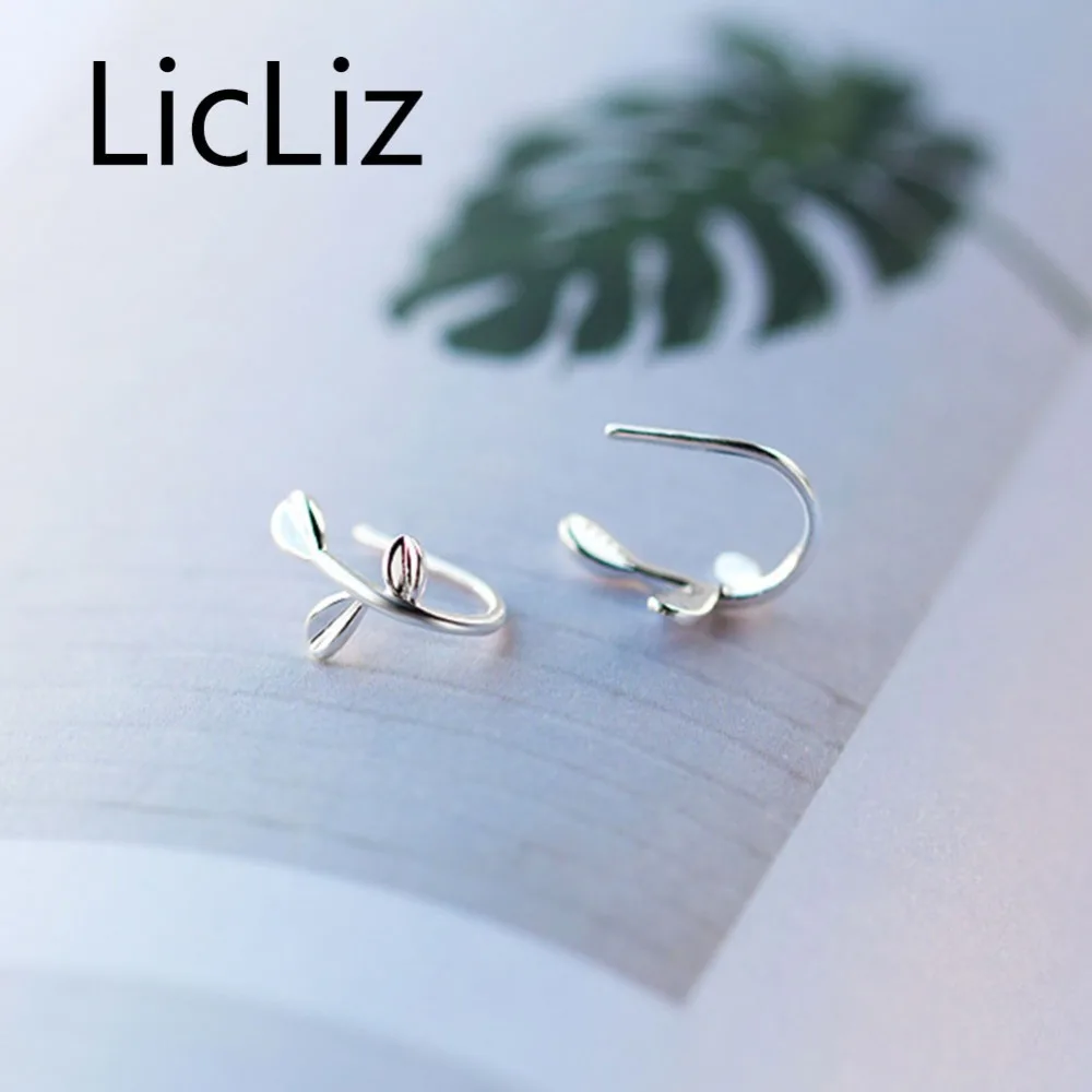 Женские серьги гвоздики в виде листьев liliz новые из белого золота с узором