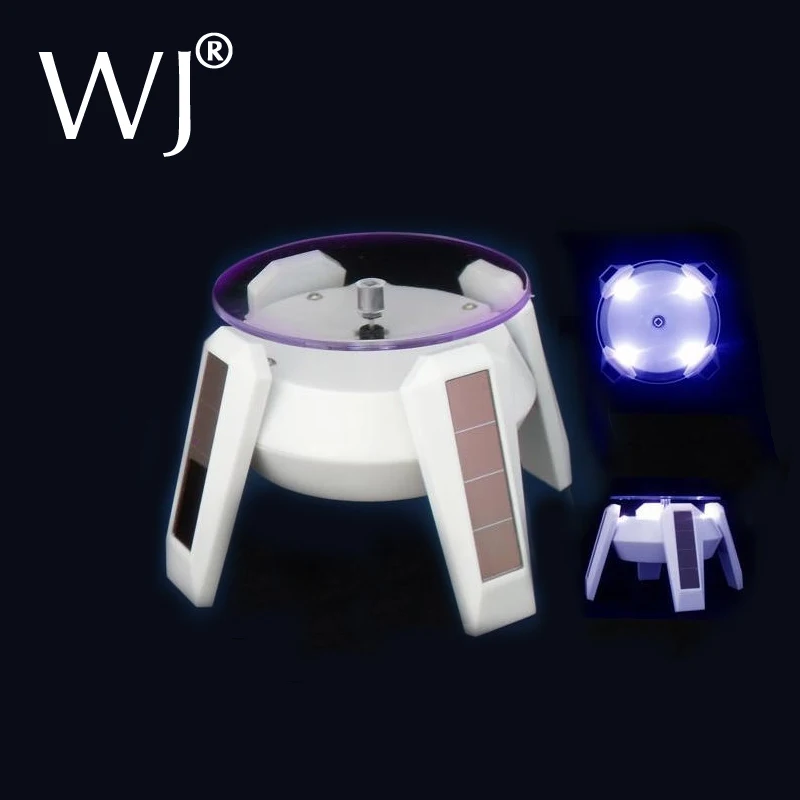 

New Solar Power 360 Degree Rotating Display Stand For Glasses Phone Beads Bracelet Watch Holder Rack LED Light Black and White