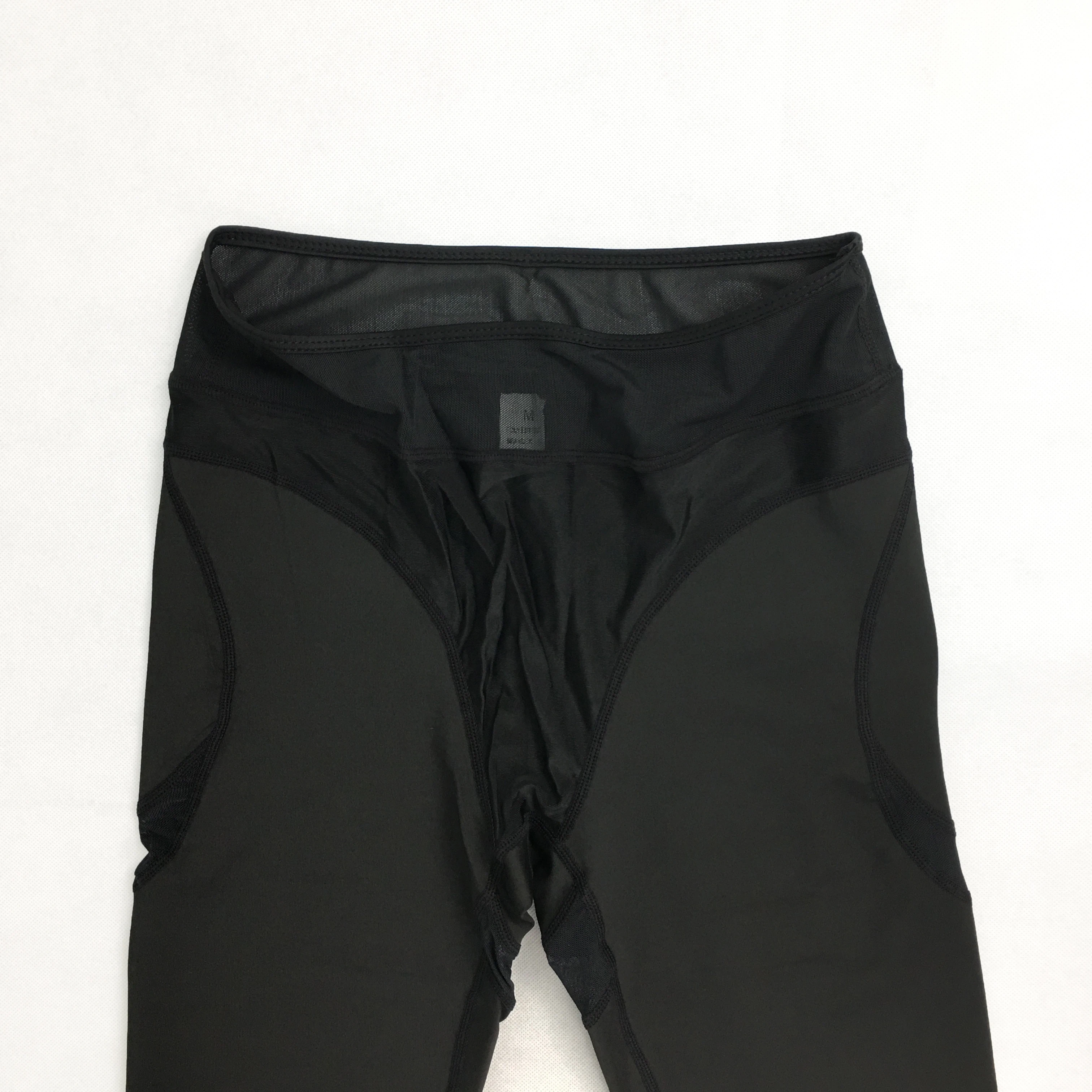 

Drop Shipping Women Hollow Net Leggings Patchwork Trangle Shape Black Leggings