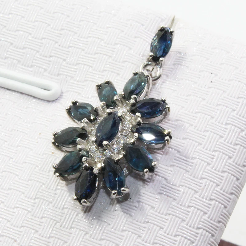 Сапфир 24. Радужный циркон камень набор серьги кольцо. Танзанит камень текстура. Mj blue sapphire. Духи 24к сапфир.