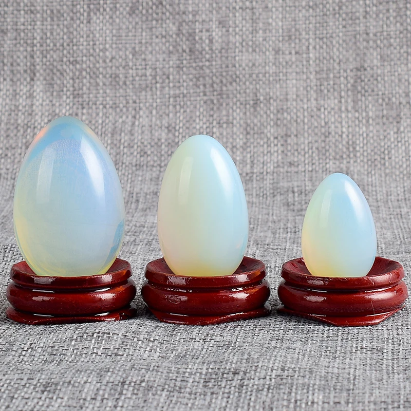 

Gemstones Natural opalite egg with wooden base stones and mineral quartz crystals Healing Balls for massage Kegel Exercise