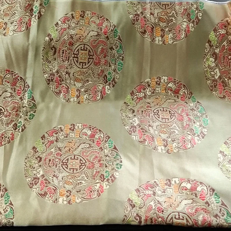 Жаккардовая ткань жаккардовая с монетами дракона удачи и цвета шампанского