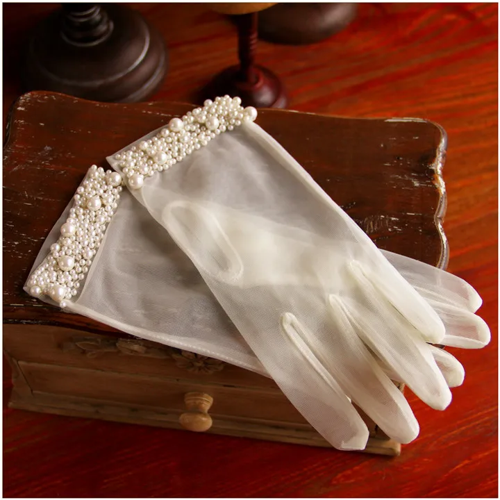 

Women's elegant pearl beaded perspective mesh short gloves female white color sexy lace glove R1250