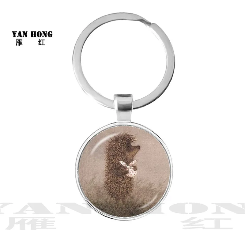 Винтажный брелок с ежиком в тумане позолоченный стеклянный кабошоном купол