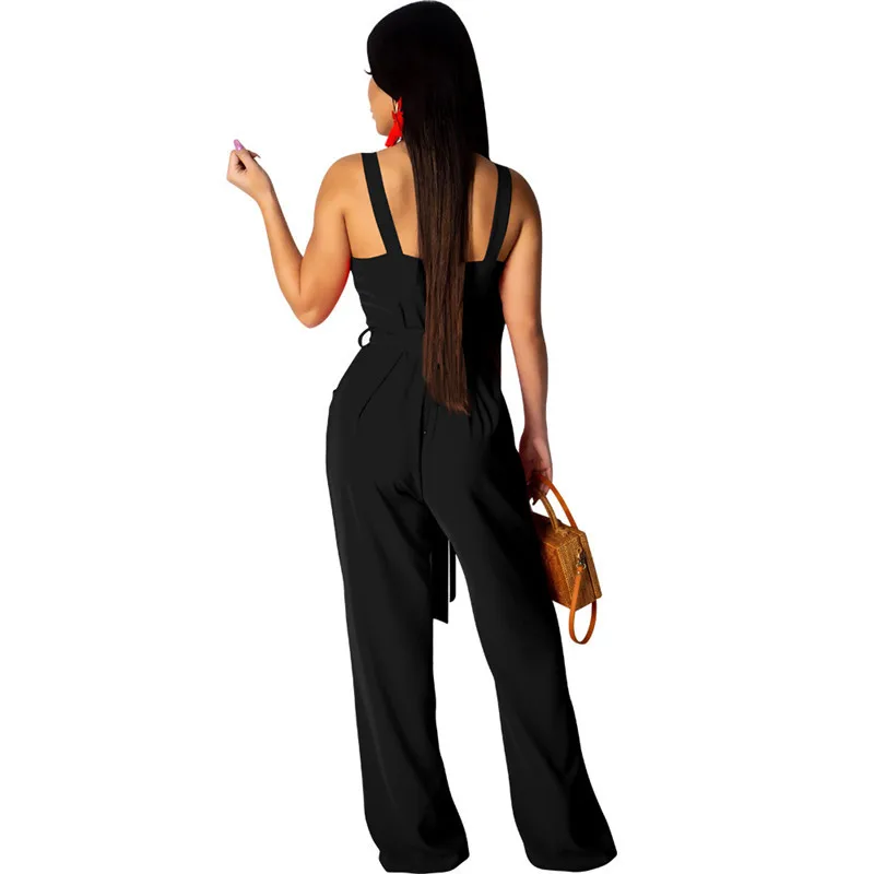 Женский комбинезон на пуговицах желтый без рукавов с открытой спиной и широкими