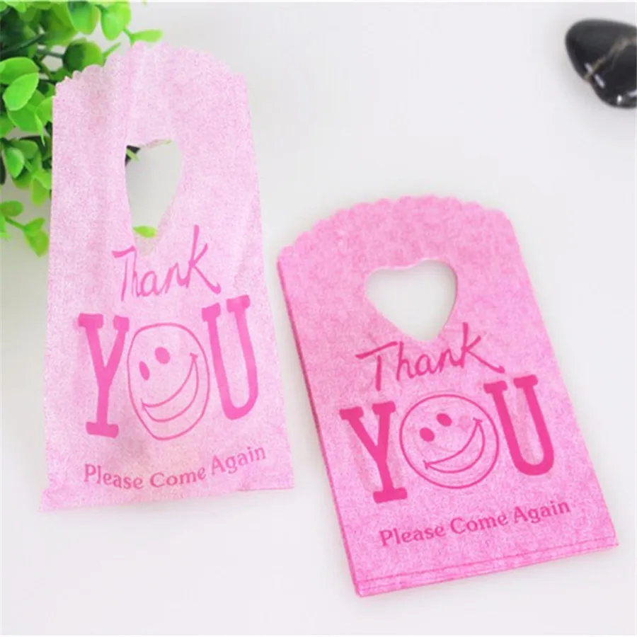 

50pcs/lot 9*15cm Mini Plastic Gift Bags Small Jewelry Pouches With Smile Face Hot Red Thank You Candy Bags Favor Wedding Party