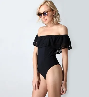 

New swimwear women Europe and America sexy hot conjoined hollow cut flower ruffled swimwear factory direct wholesale Polyester