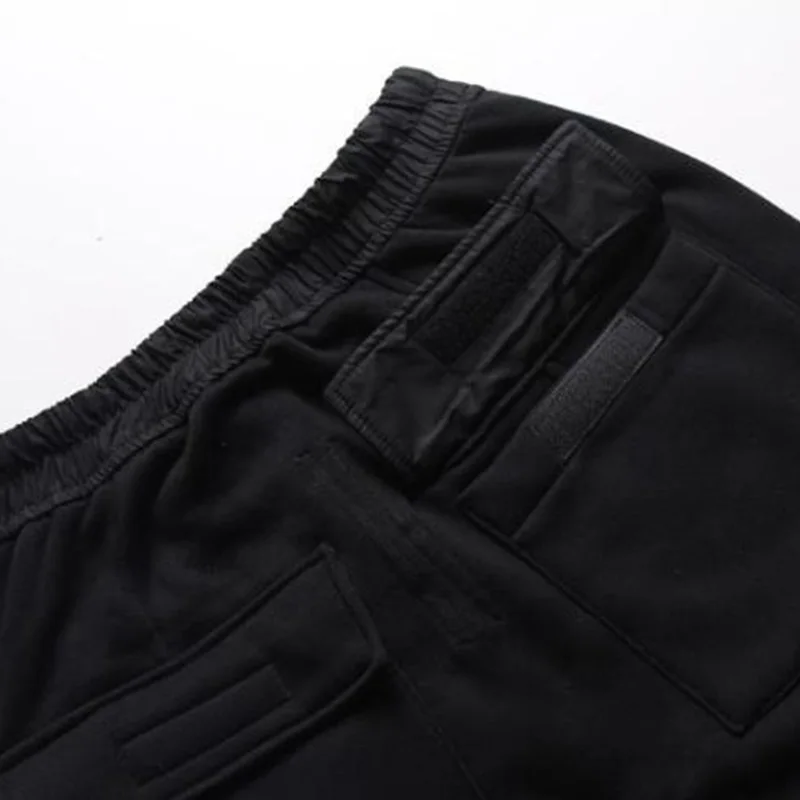 Мужские черные шаровары Jogger Штаны High Street падение промежности пота Штаны эластичный пояс хип-хоп низкий шаговый шов бегунов хип карманы с клапанами