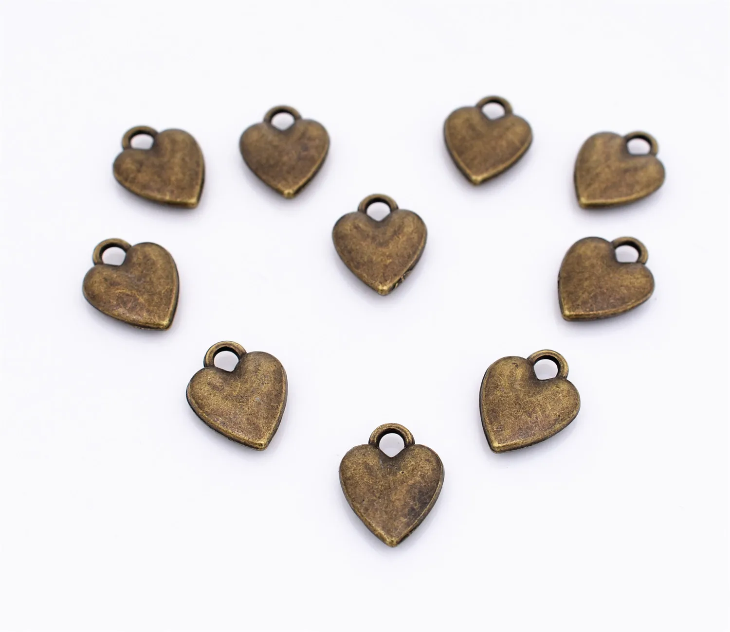 

20pcs/lot 14x10x3mm Antique Bronze Plated Heart Charms Pendant DIY Handmade Jewelry Accessories