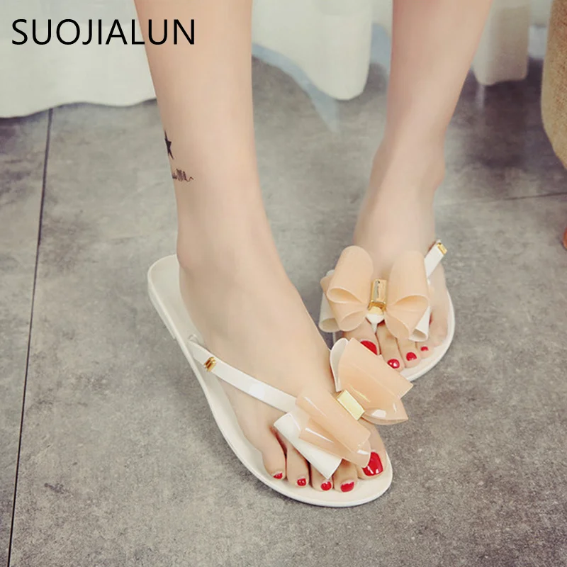 Женские шлепанцы на плоской подошве SUOJIALUN прозрачные с бантом лето 2019|fashion