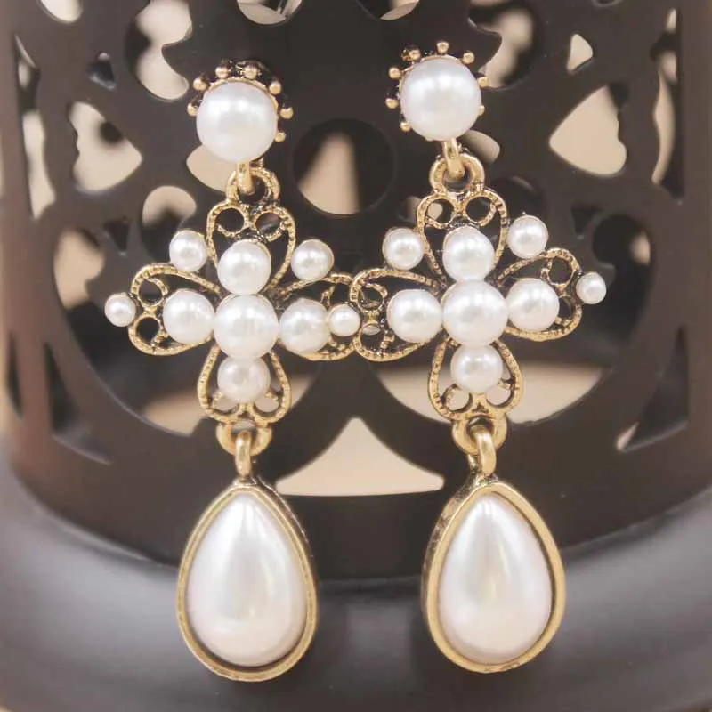 925 Серебряные иглы чистый жемчуг Висячие серьги для женщин Асимметричная звезда