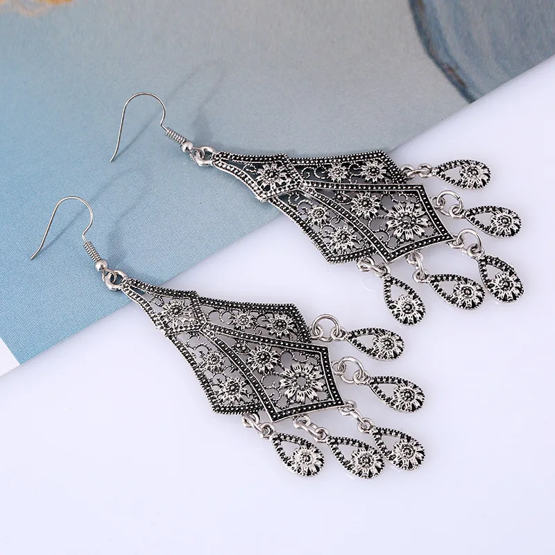 LiuXSPVintage капли воды этнические серьги кисточки вырезка полые цветок металла