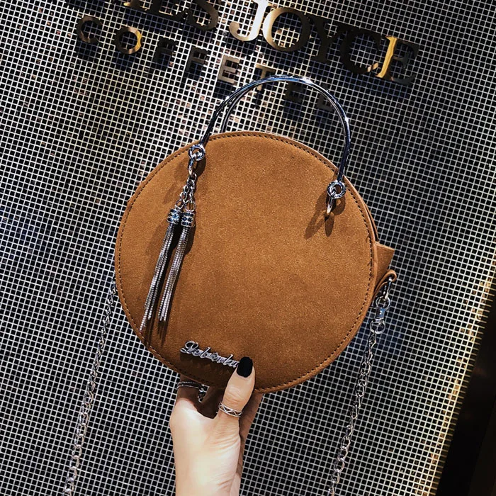 Винтажная женская сумка мессенджер с металлической ручкой маленькая круглая