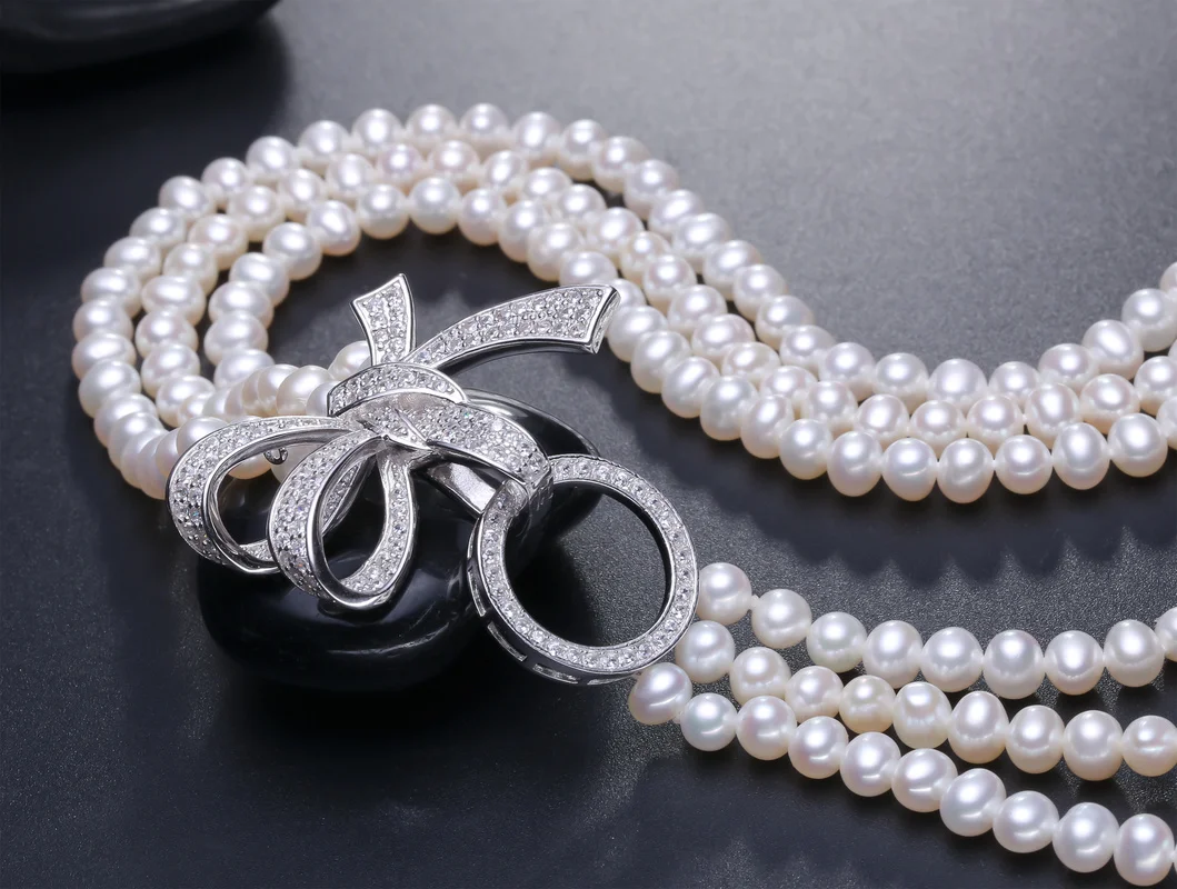 ????? 2020新40センチメートル5-6ミリメートル3行天然淡水真珠のネックレスのチェーン女性ガール完璧弓ネクタイショート鎖骨ネックギフト