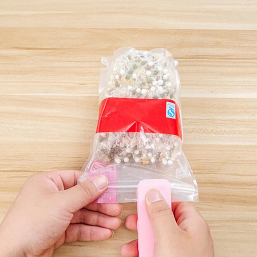 Portable Bag Clips Handheld Mini Electric Heat Sealing Machine Impulse Sealer Seal Packing Plastic work with battery |