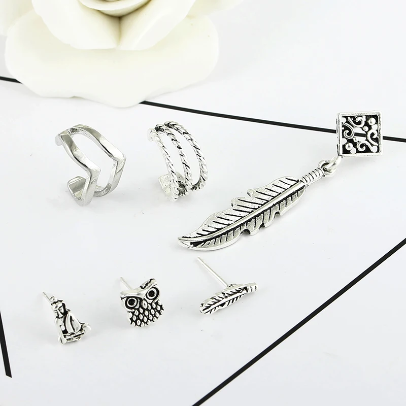 Женские серьги-каффы в стиле панк рок с цепочкой виде листика кисточками