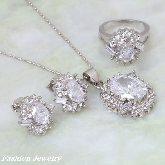 Комплект ювелирных изделий из кольца и серёг, с фианитом