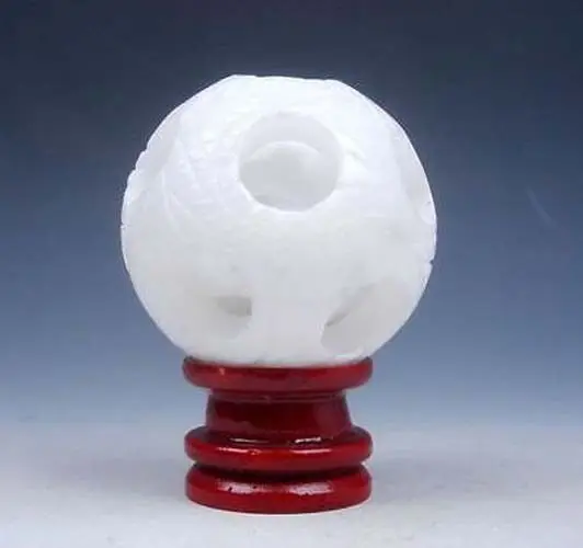 

Three jade ball ornaments