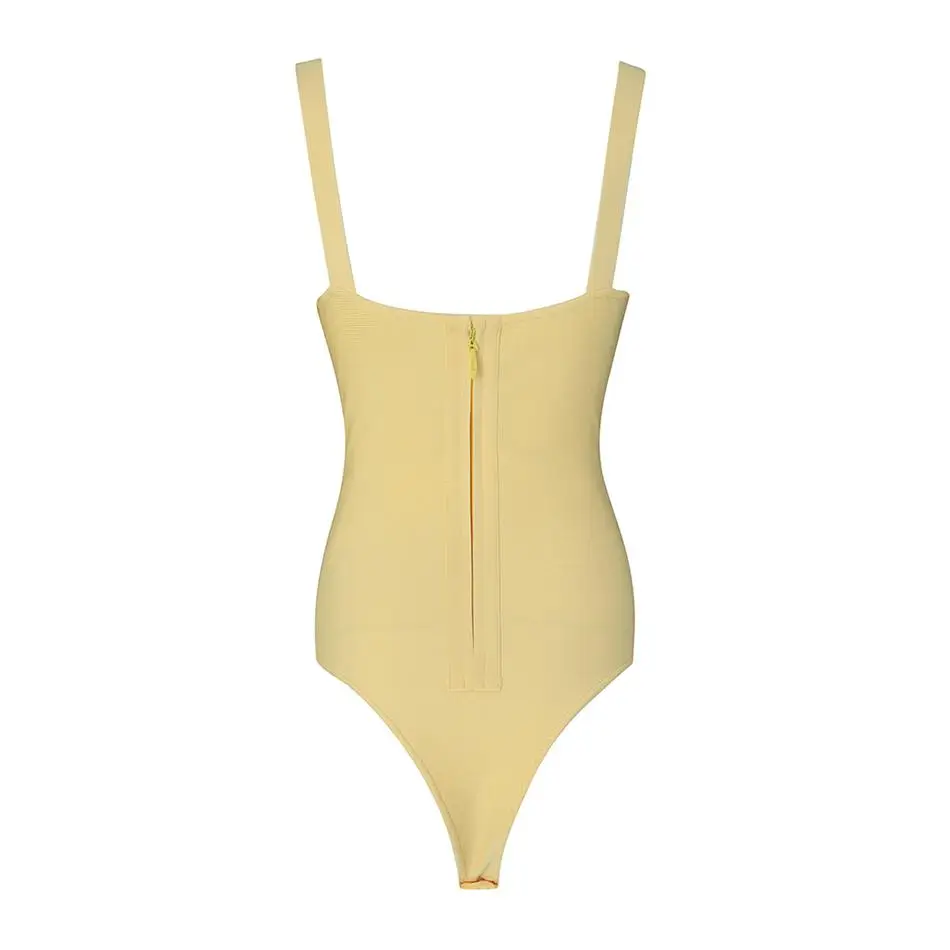 Женский комбинезон на бретелях-спагетти желтый бандажный с вырезами для
