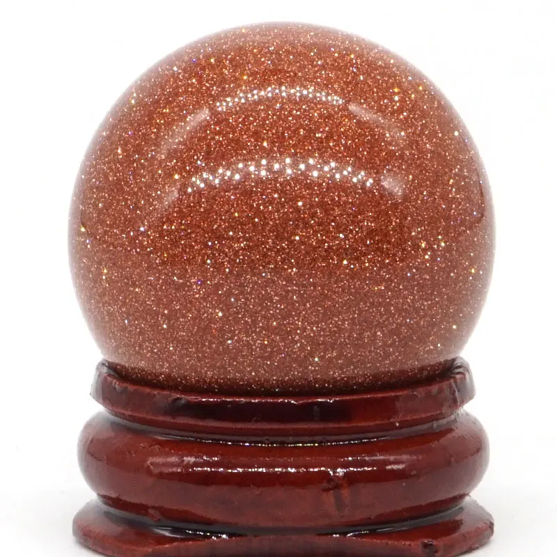 Красивый красный золотистый песочный шар минеральный семейный массажный