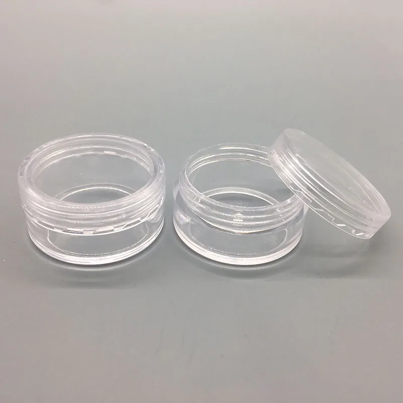

Free shipping 500pcs/lot 10ml 10gram 10g PS Clear Cosmetics Cream Container Sample Jars with colored Lids