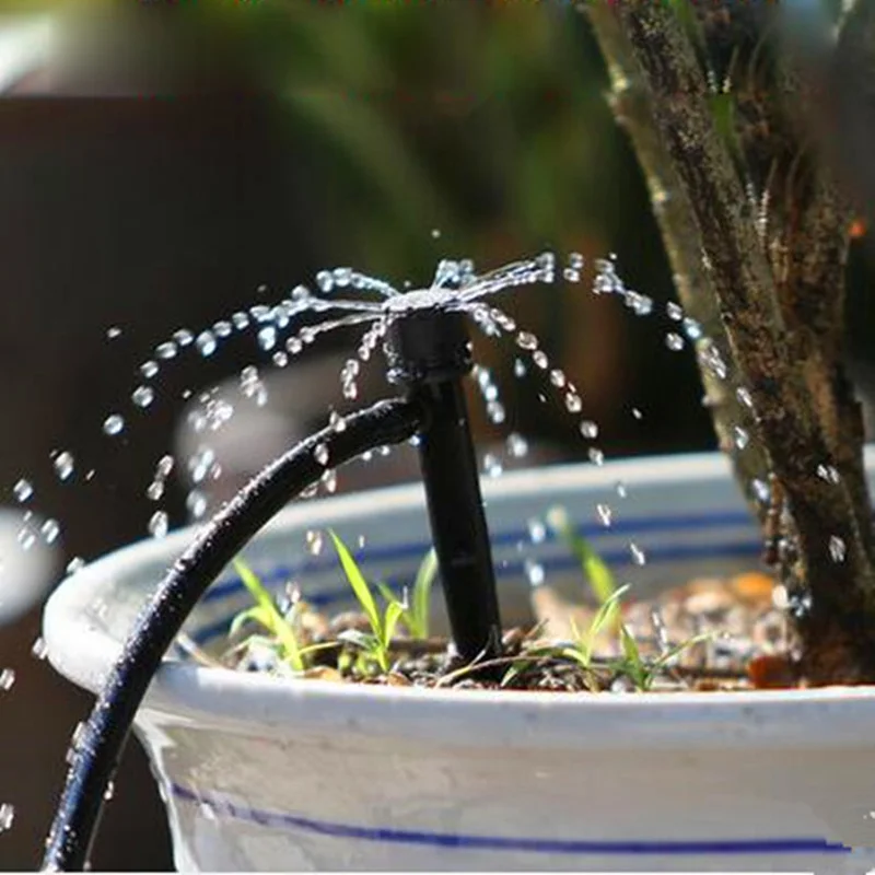 Полив комнатных растений. Поливать стекла. Птичка для полива цветов стеклянная. Полив лейкой. Колба для цветов.