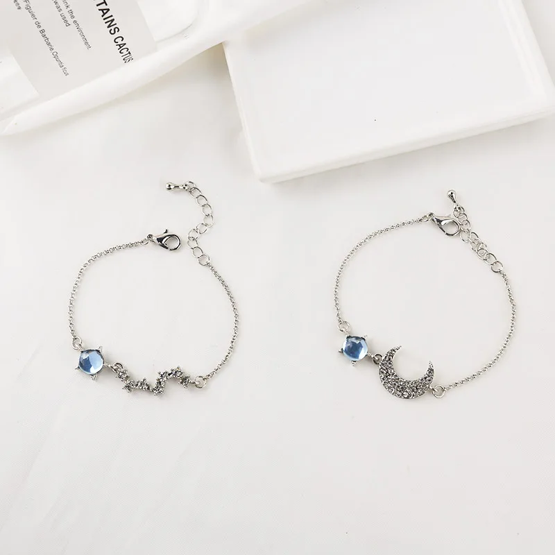 Женский элегантный браслет роскошный гламурный с синим стеклом и блестящим