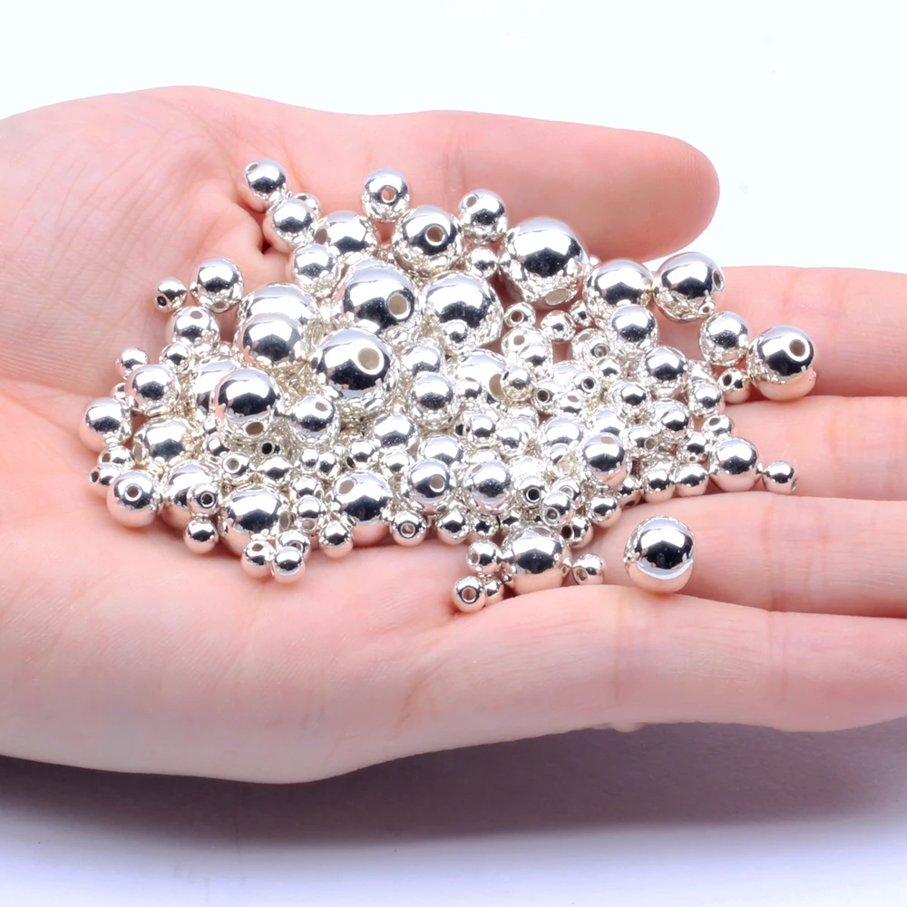 Имитация жемчуга золотого и серебряного цвета круглой формы с прямым отверстием