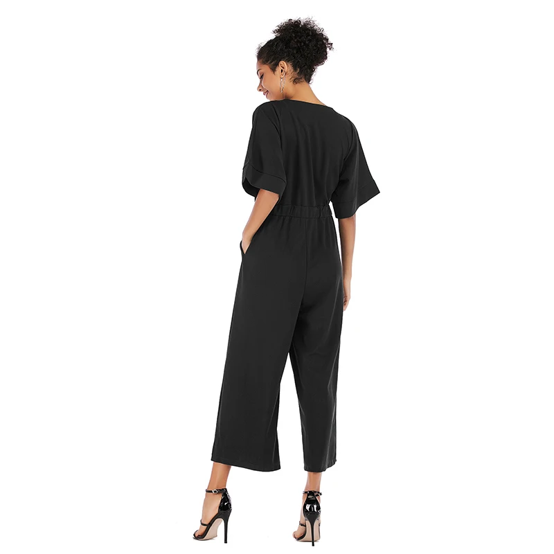 Женский комбинезон свободного покроя однотонный с V-образным вырезом на лето 2019