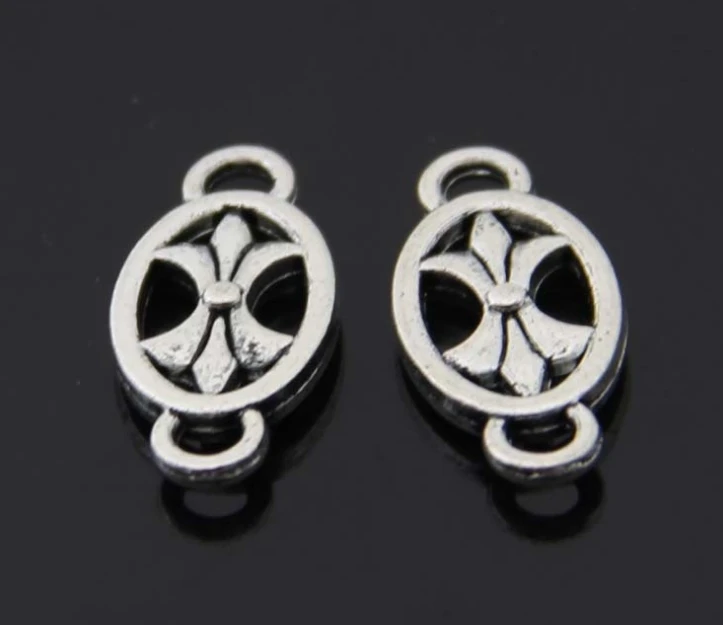 

Free shipping Antique Silver Planted Filigree 2 Holes 2 Holes Oval Connector Fleur-De-Lis Jewelry 15Pcs Size 21*9mm