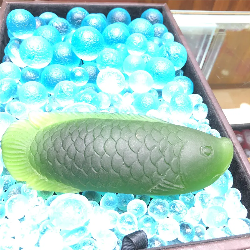 

Large Size Green Moldavite Czech Arowana Hand Carved Fish Meteorite Impact Glass Rough Stone Crystal Energy Stone