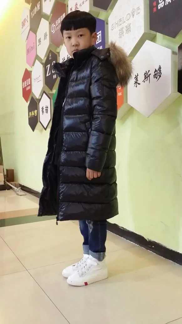 Толстый длинный пуховик на зиму