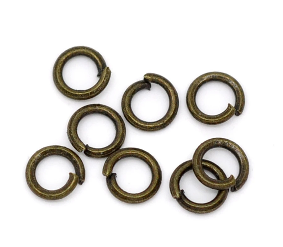 Открытые соединительные кольца DoreenBeads 1500 бронзового оттенка диаметр 4 мм Выводы