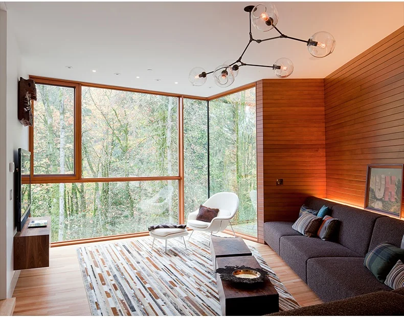 Стеклянная люстра в виде ветвей прозрачного цвета/дымчато