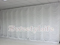 pure white luxury water fall wedding backdrop with scale drapes party decoration