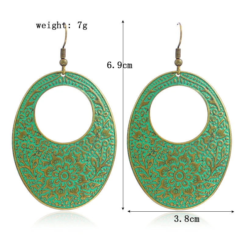 The cyan ellipse has a hollow rounded circle inside and is surrounded by large flowers vines to form vintage earring. | Украшения и