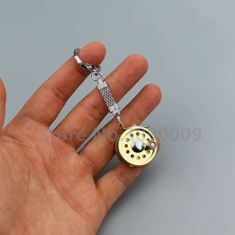 

Creative gold silver retractable scroll key chain fish wheel keychain fishing enthusiast metal pendant key ring