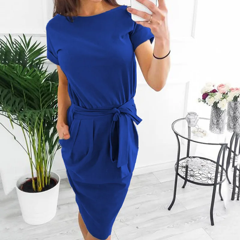 Женское облегающее платье с коротким рукавом и круглым воротником карманами для