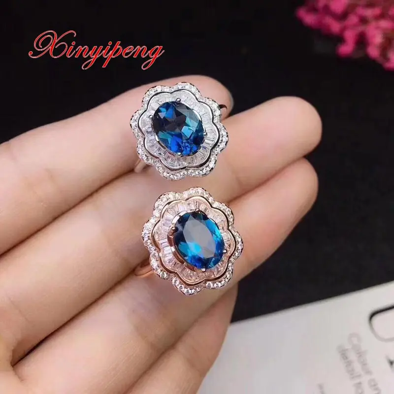 

Xin yi peng 925 silver inlaid natural blue topaz stone ring women ring beautiful ring fashion