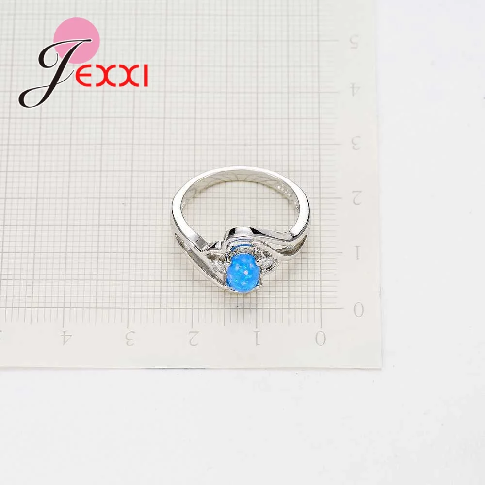 Спиральные мистические овальные камни из синего опала обручальные кольца