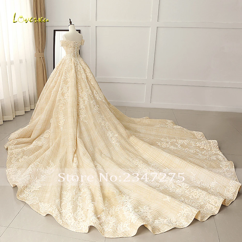 

Loverxu Vestido De Noiva Lace Ball Gown Wedding Dresses 2019 Luxury Boat Neck Appliques Beaded Crystal Royal Train Bridal Gown