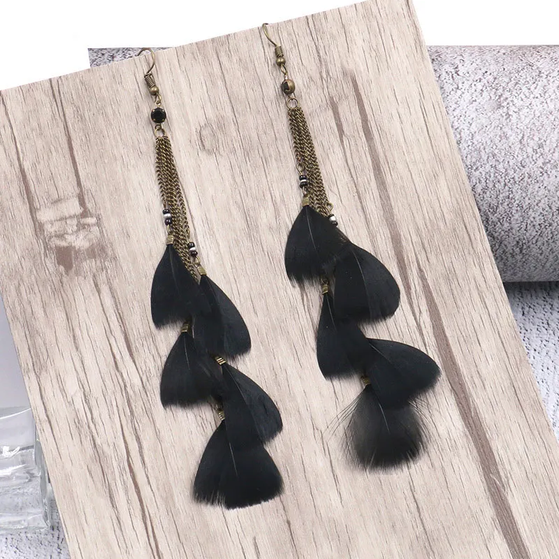 Женские длинные серьги-кисточки Boho с черным пером в этническом стиле