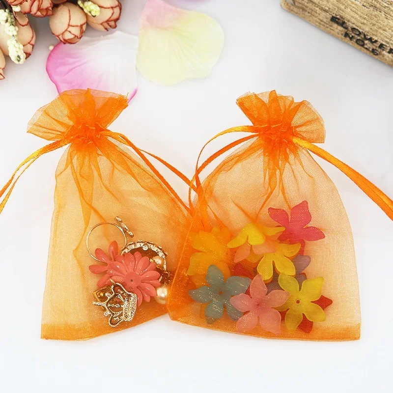 

Hot Sale Organza Bag 100pcs/lot 17x23cm 23 Color In Stock Drawstring Gifts Toys Jewelry Boutique Promotion Packaging Pouches