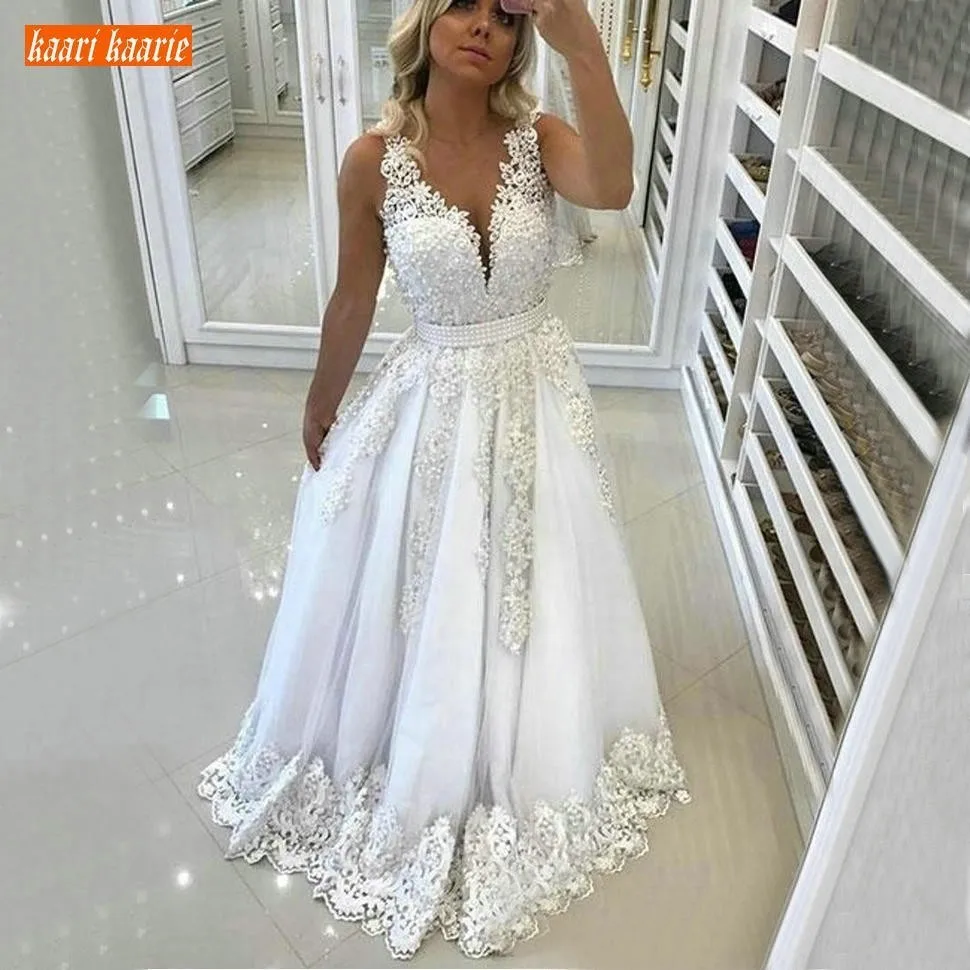 

Luxurious White Deep V-Neck Wedding Dresses Floor Length Tulle Appliques Backless Bride Dresses A Line Sleeveless Wedding Gowns