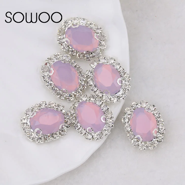 Опал розового цвета овальной формы 10*14 горный хрусталь пришить на с когтями