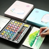 high quality 36 colors portable travel solid pigment watercolor paints set with watercolor brush pen for painting art supplies