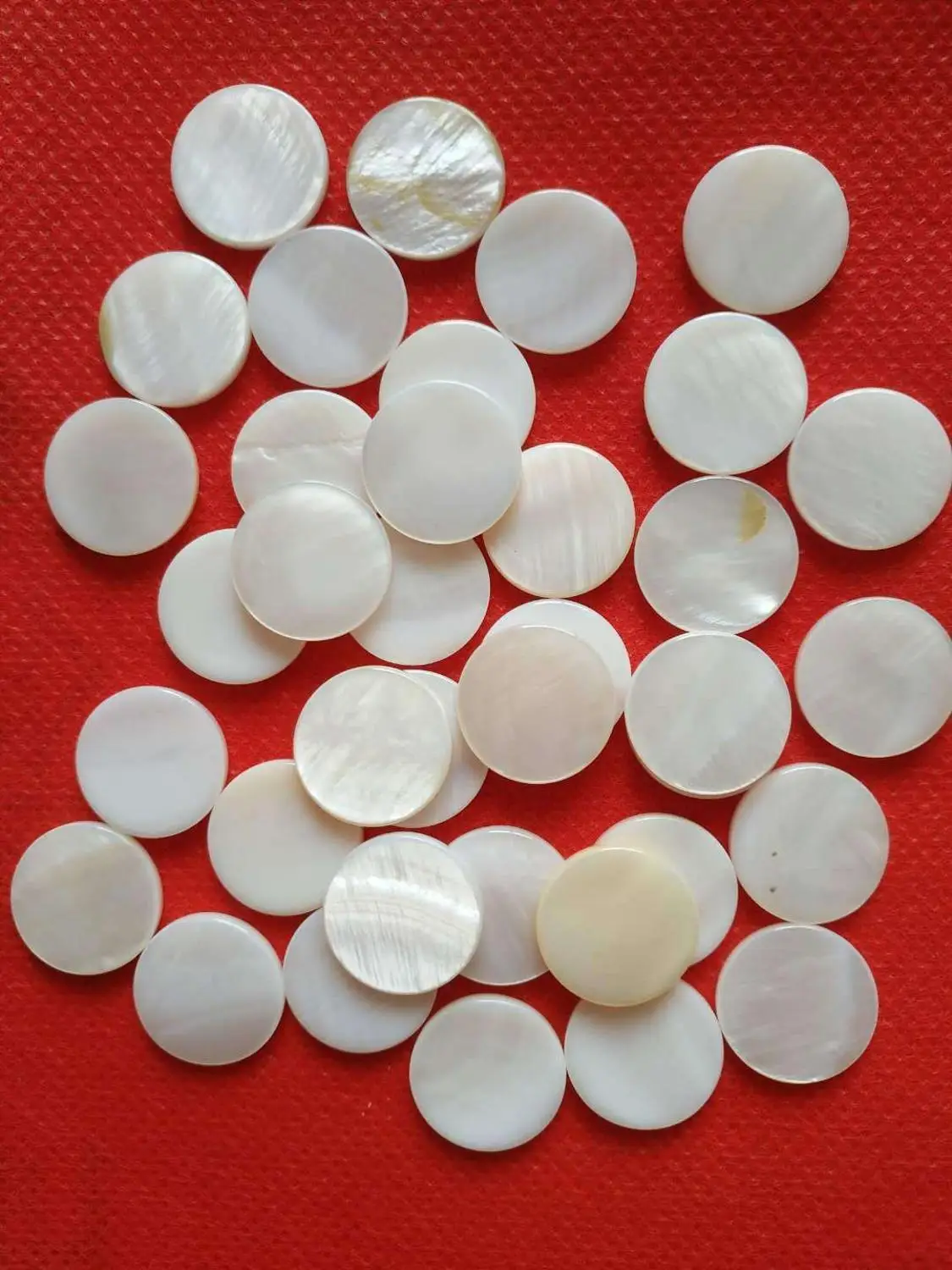 

60 pcs saxophone finger buttons on mother-of-pearl material 14.7mm
