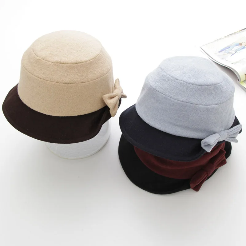 

Free shipping High Quality Casual Woman Fedoras Wool Bucket Caps Classic Handwork Bow Patchwork Short Brim Round Caps Bowler Hat